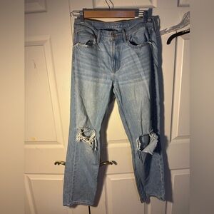 American Eagle Light Wash Denim with Tan Patch